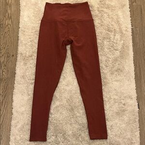 Beyond Yoga Spacedye caught in the midi High-Waisted Rust/Clay Leggings. XS